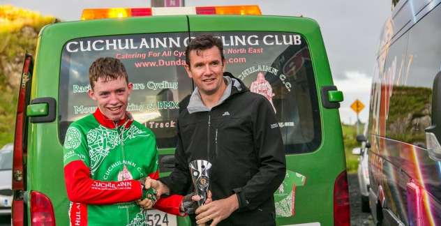 Lorcan Kilkenny winner of Round 10, being presented with his trophy from the Bike's Stations Karl Dolan